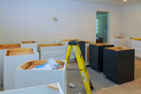 Kitchen cabinets installation Blind corner cabinet, island drawers and counter installed